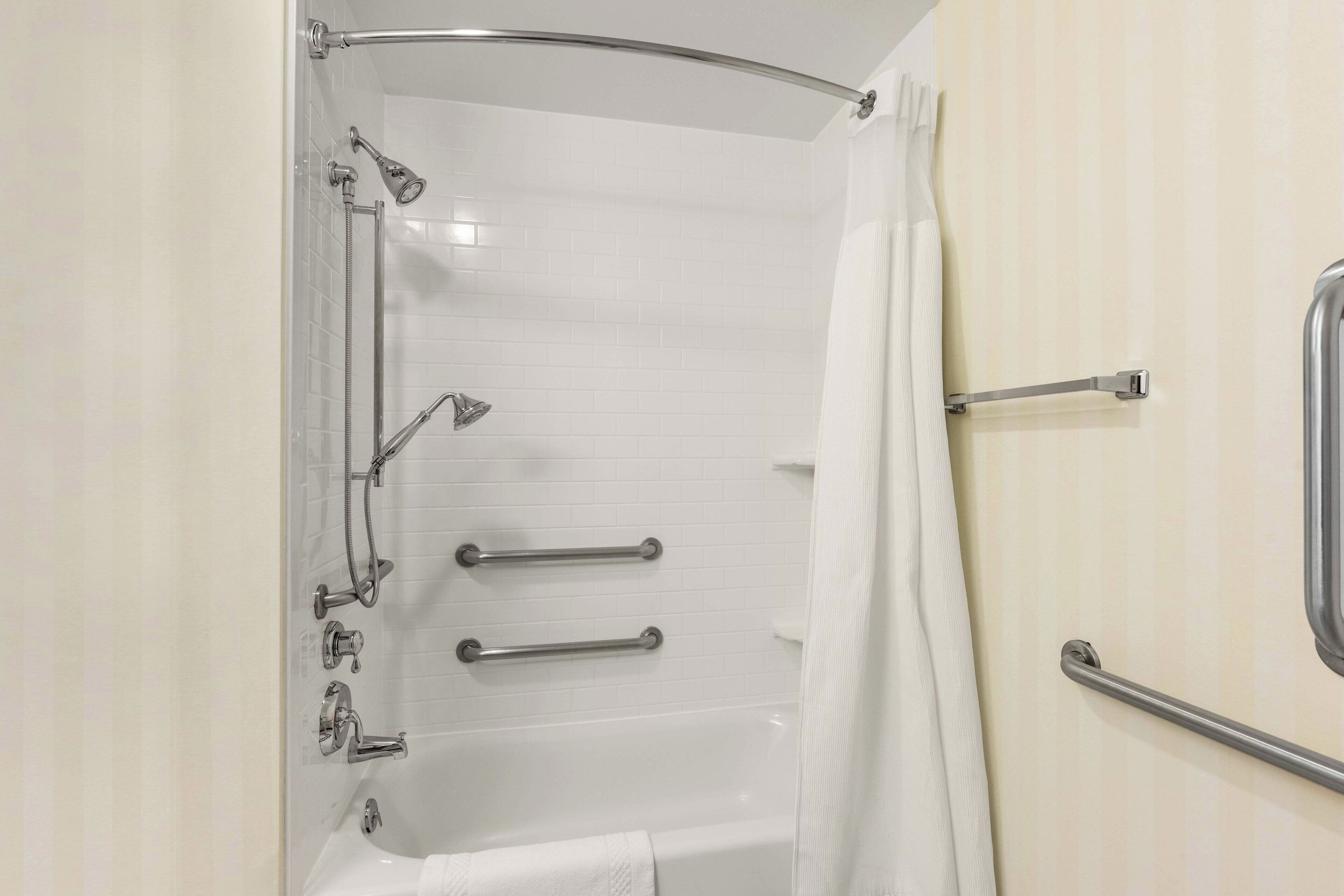 combined shower/bathtub, free toiletries, hair dryer, towels