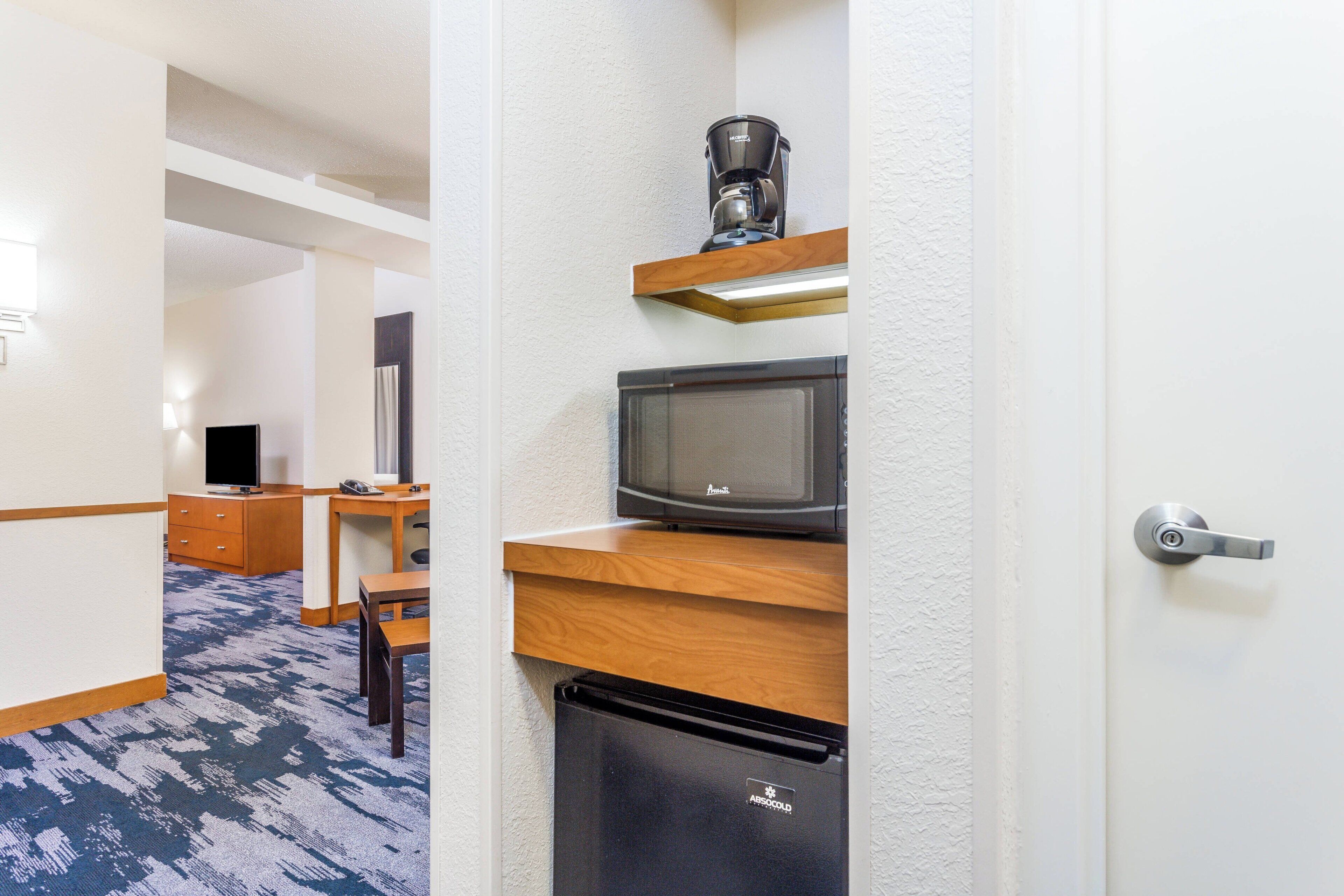 hypo-allergenic bedding, desk, blackout curtains, iron/ironing board