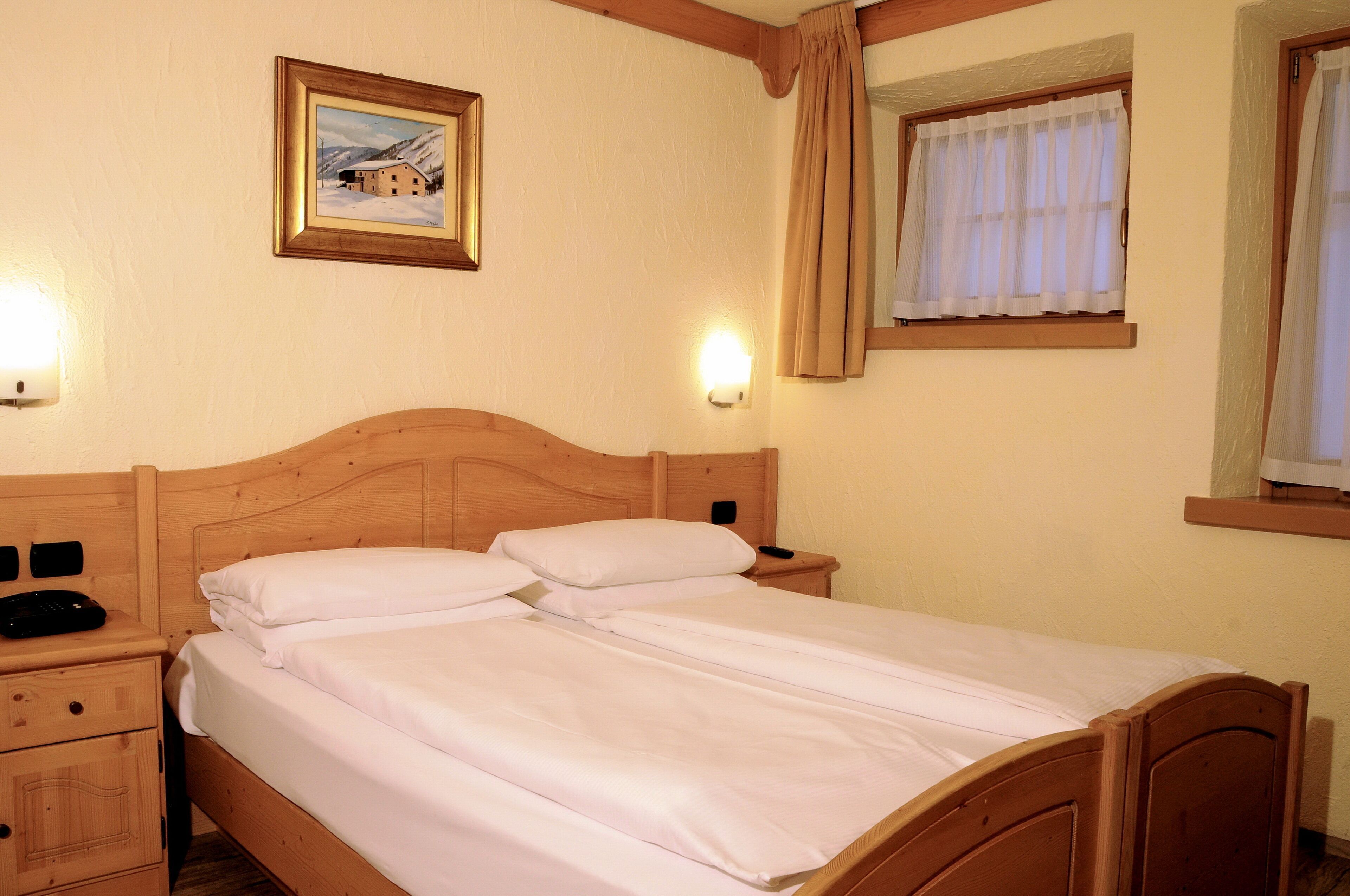 Luxe beddengoed, donzen dekbedden, een kluis op de kamer, beddengoed