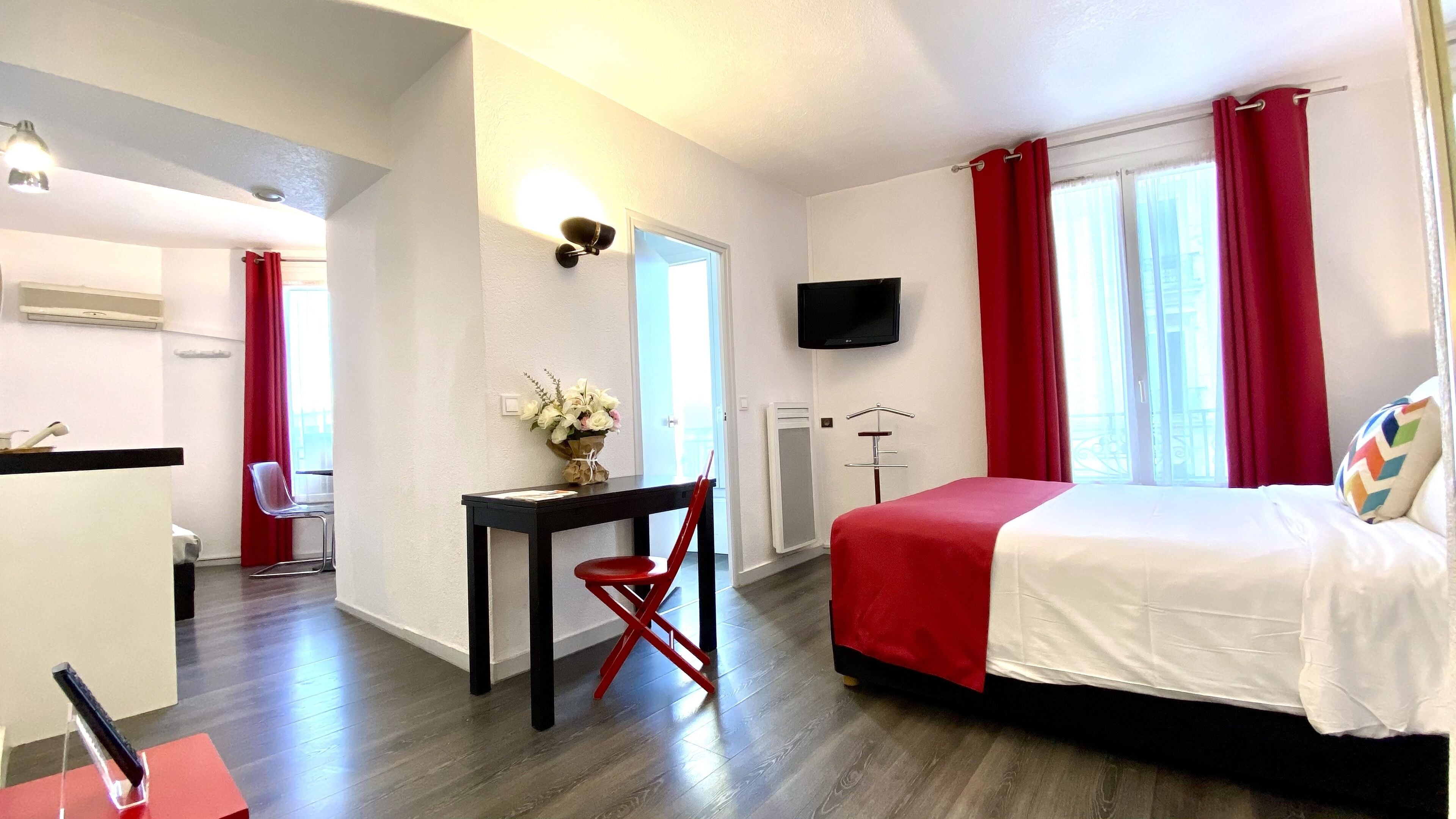 Luxe beddengoed, een minibar, een kluis op de kamer, een laptopwerkplek