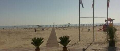 Gandules de platja, para-sols per a la platja i tovalloles de platja