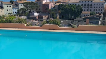 Outdoor pool, pool umbrellas, pool loungers
