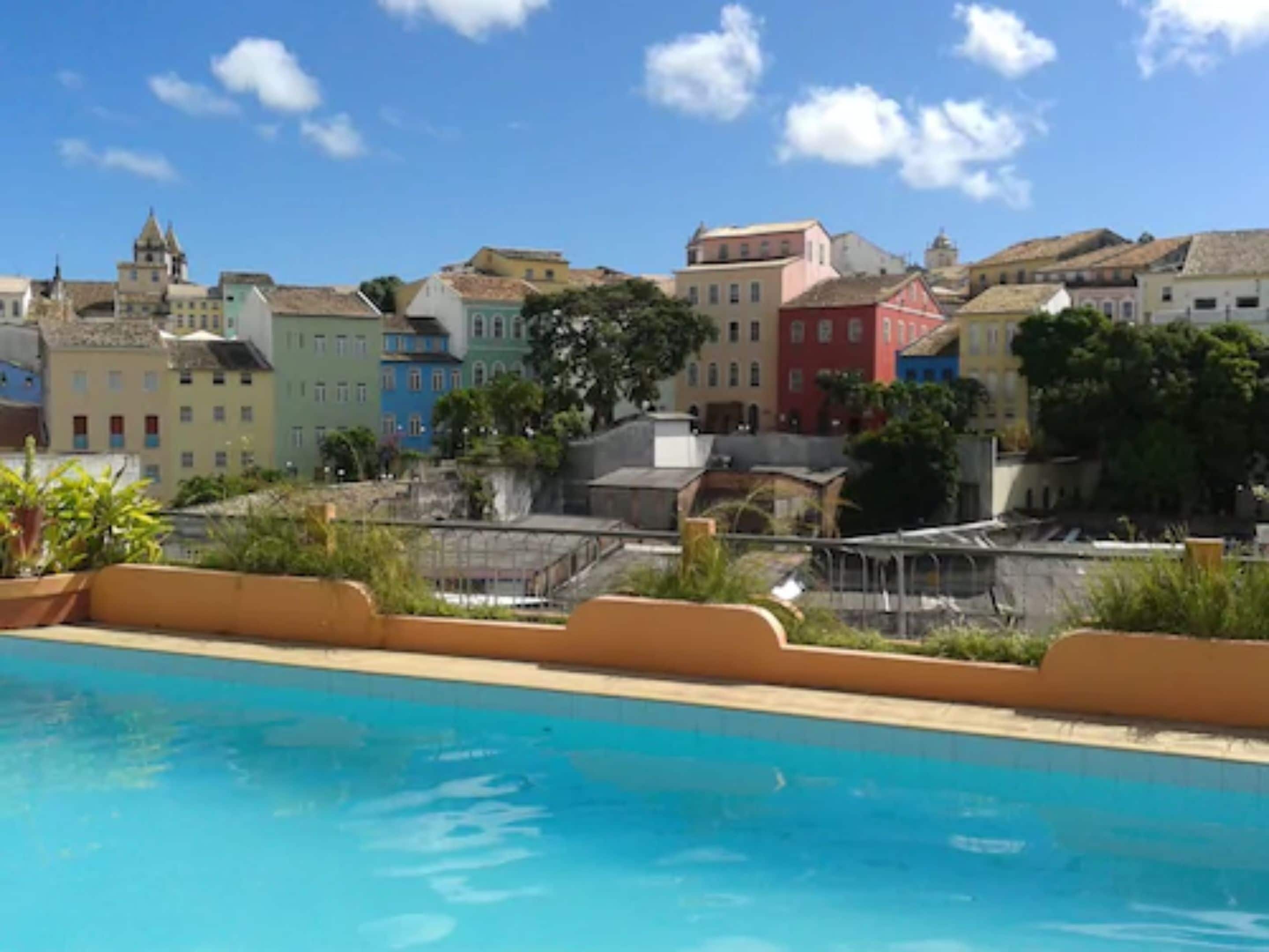 Outdoor pool, pool umbrellas, sun loungers