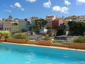 Outdoor pool, pool umbrellas, sun loungers