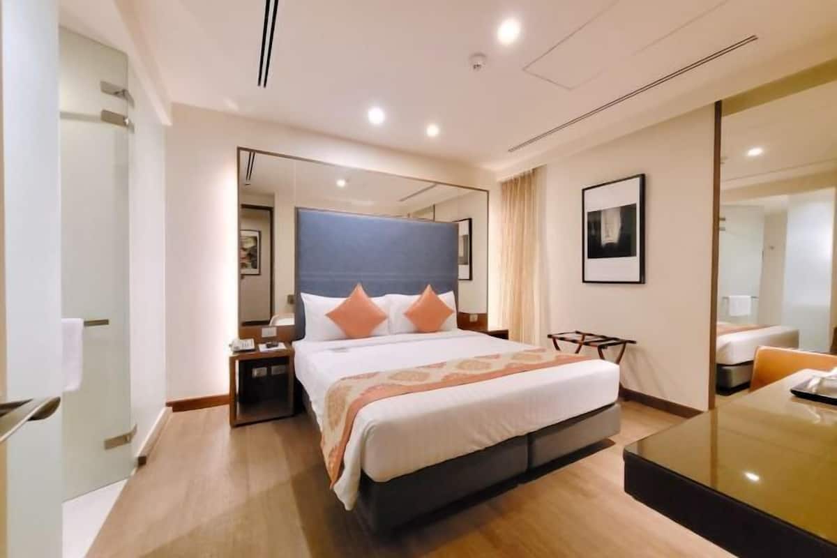 Biancheria da letto di alta qualità, minibar, cassaforte in camera