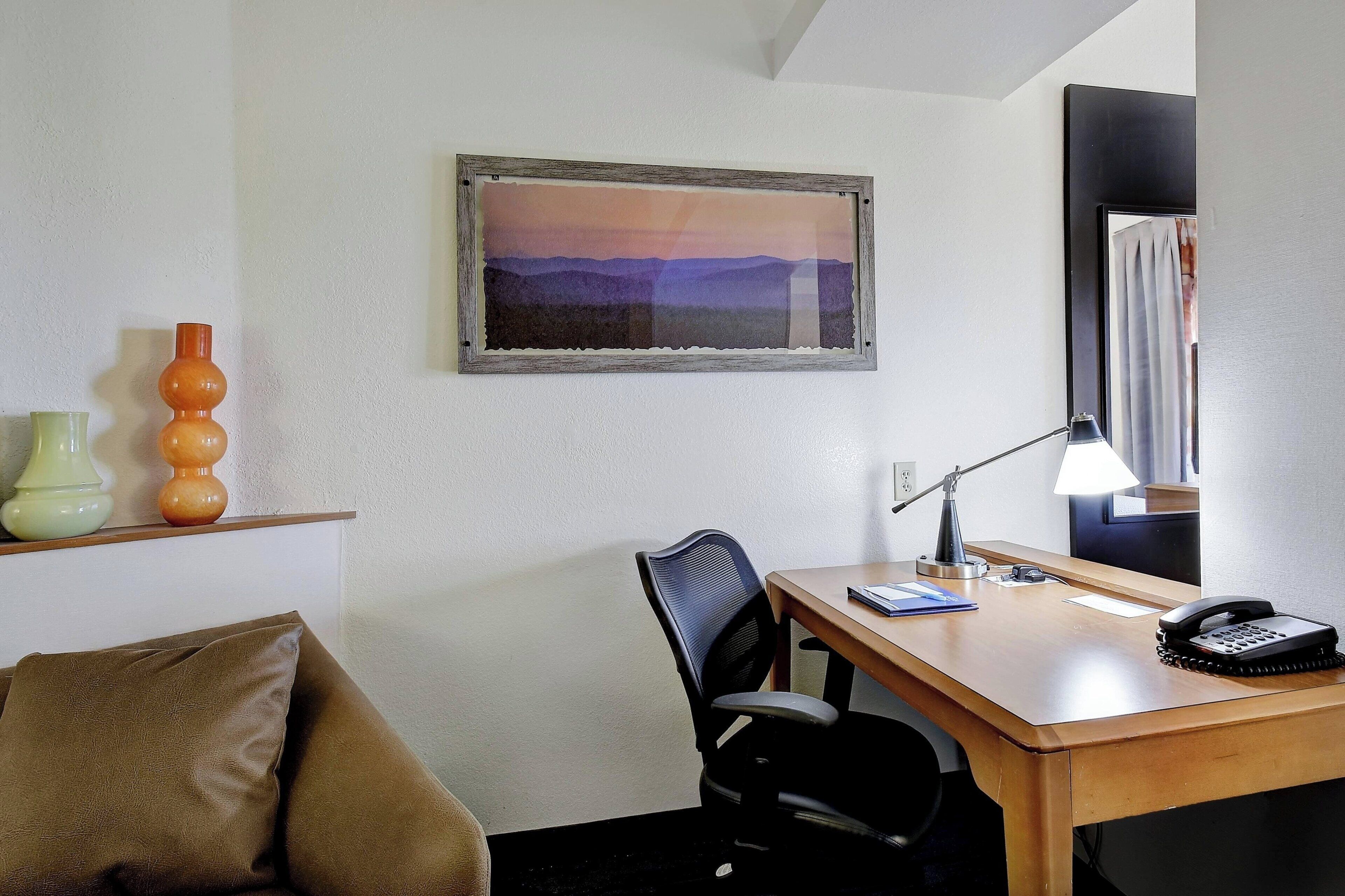 down duvets, pillow-top beds, desk, laptop workspace