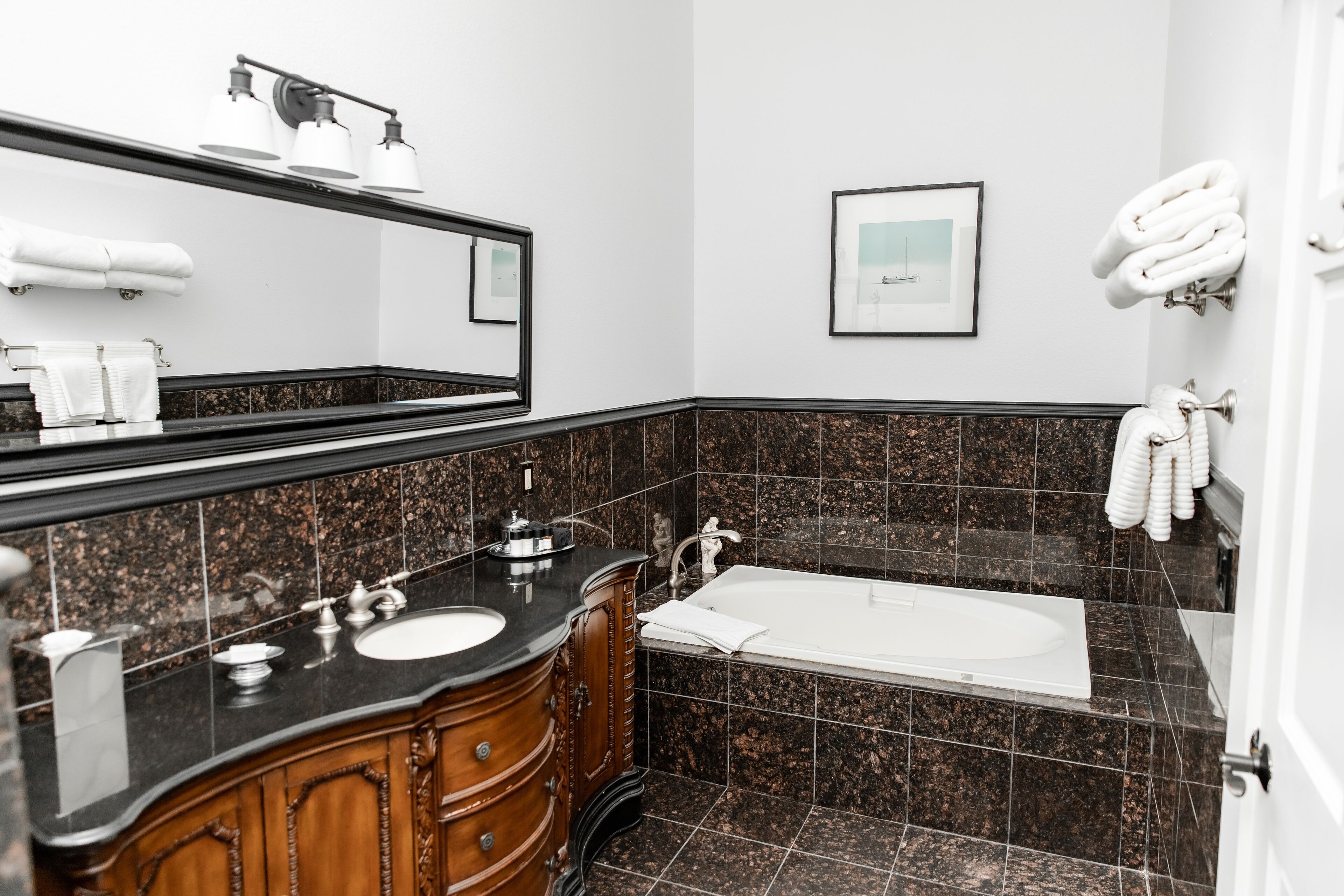 hydromassage showerhead, hair dryer, bathrobes, towels