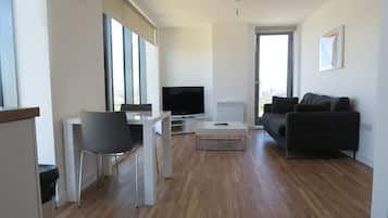 Apartment, 2 Bedrooms | Living area | Flat-screen TV, video game console, DVD player