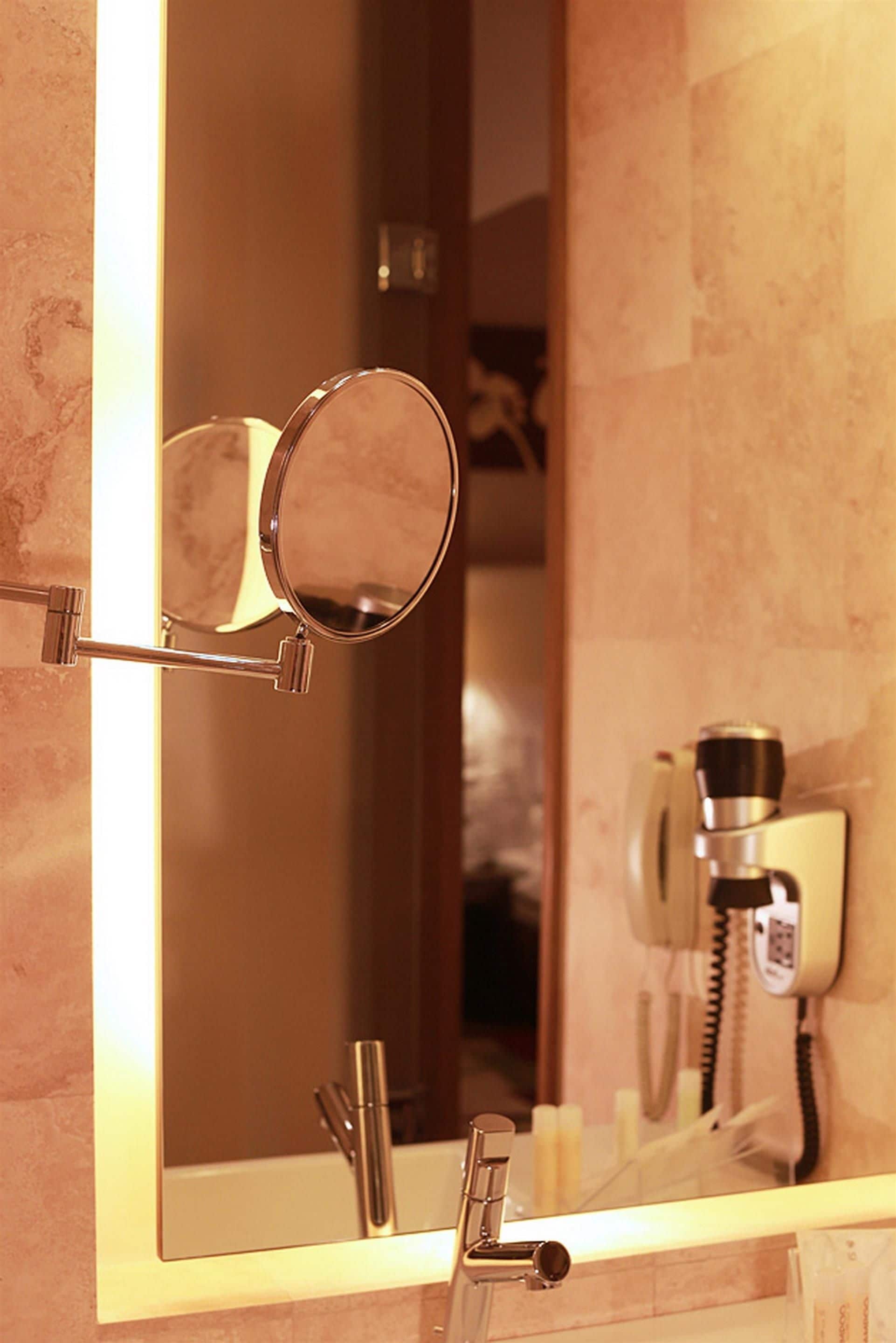 combined shower/bathtub, eco-friendly toiletries, hair dryer, bathrobes