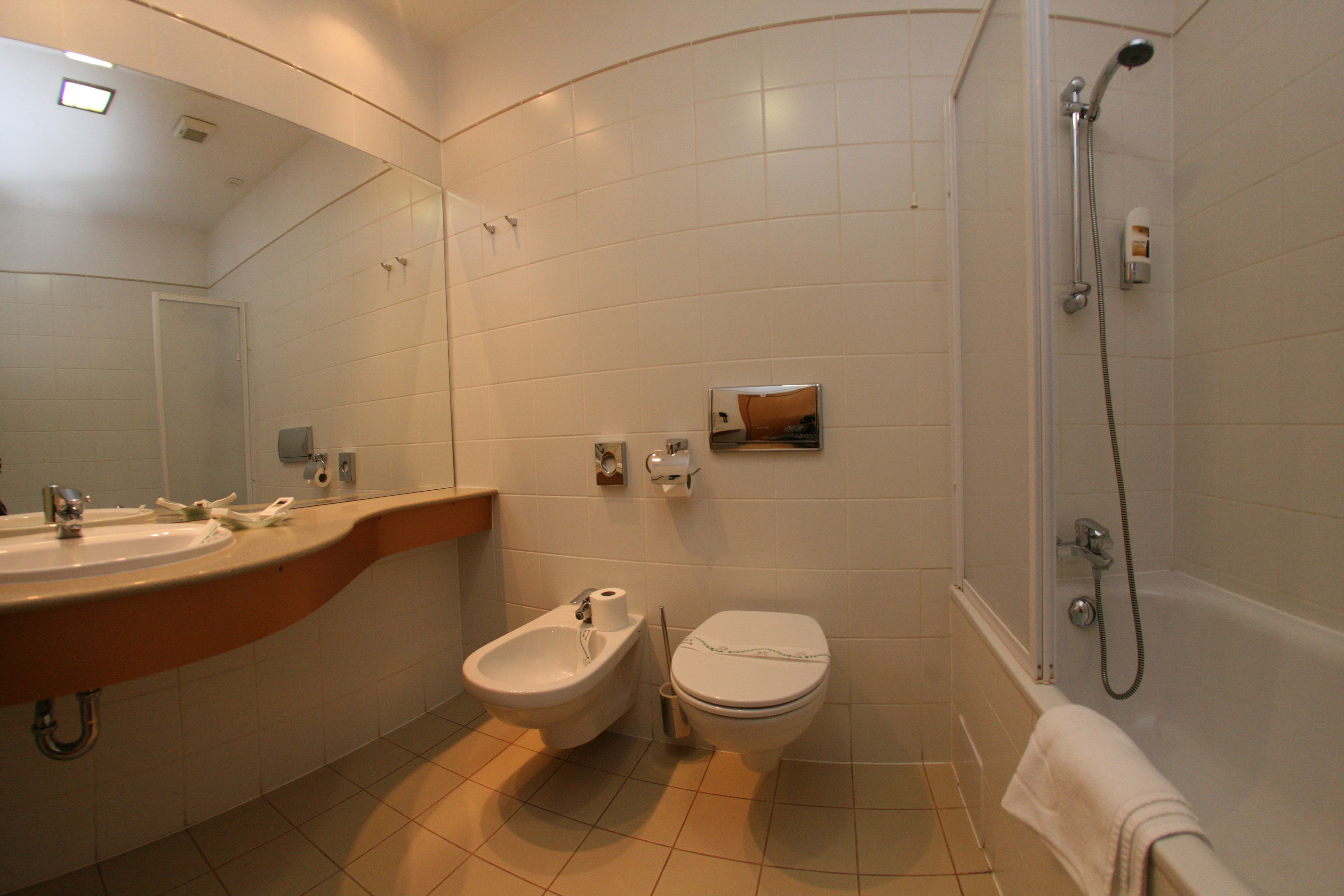 free toiletries, hair dryer, slippers, towels