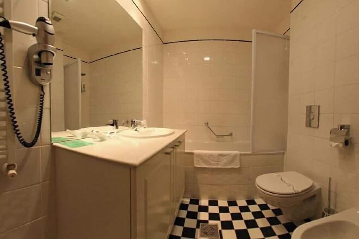 Bathroom | Free toiletries, hair dryer, slippers, towels