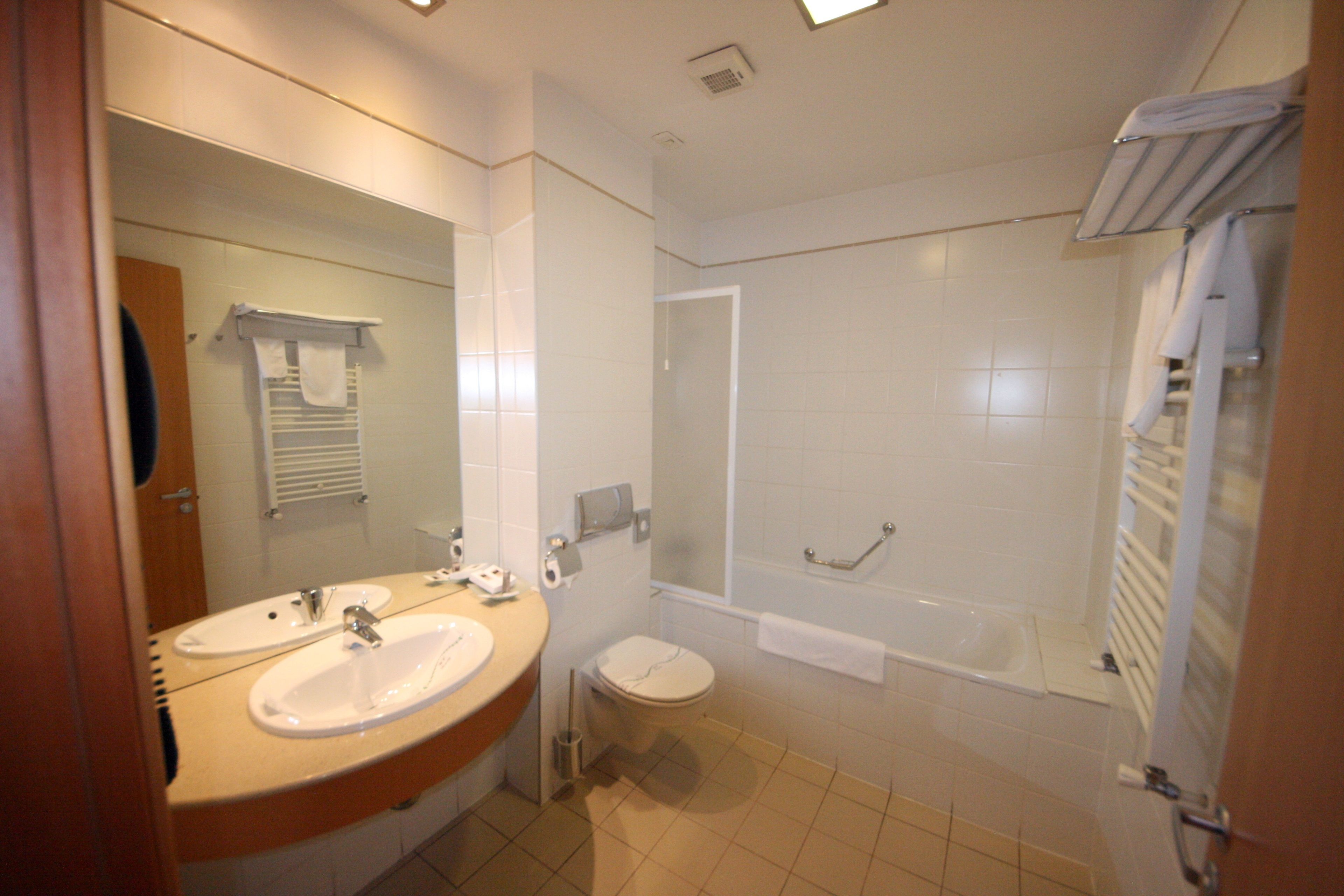 free toiletries, hair dryer, slippers, towels