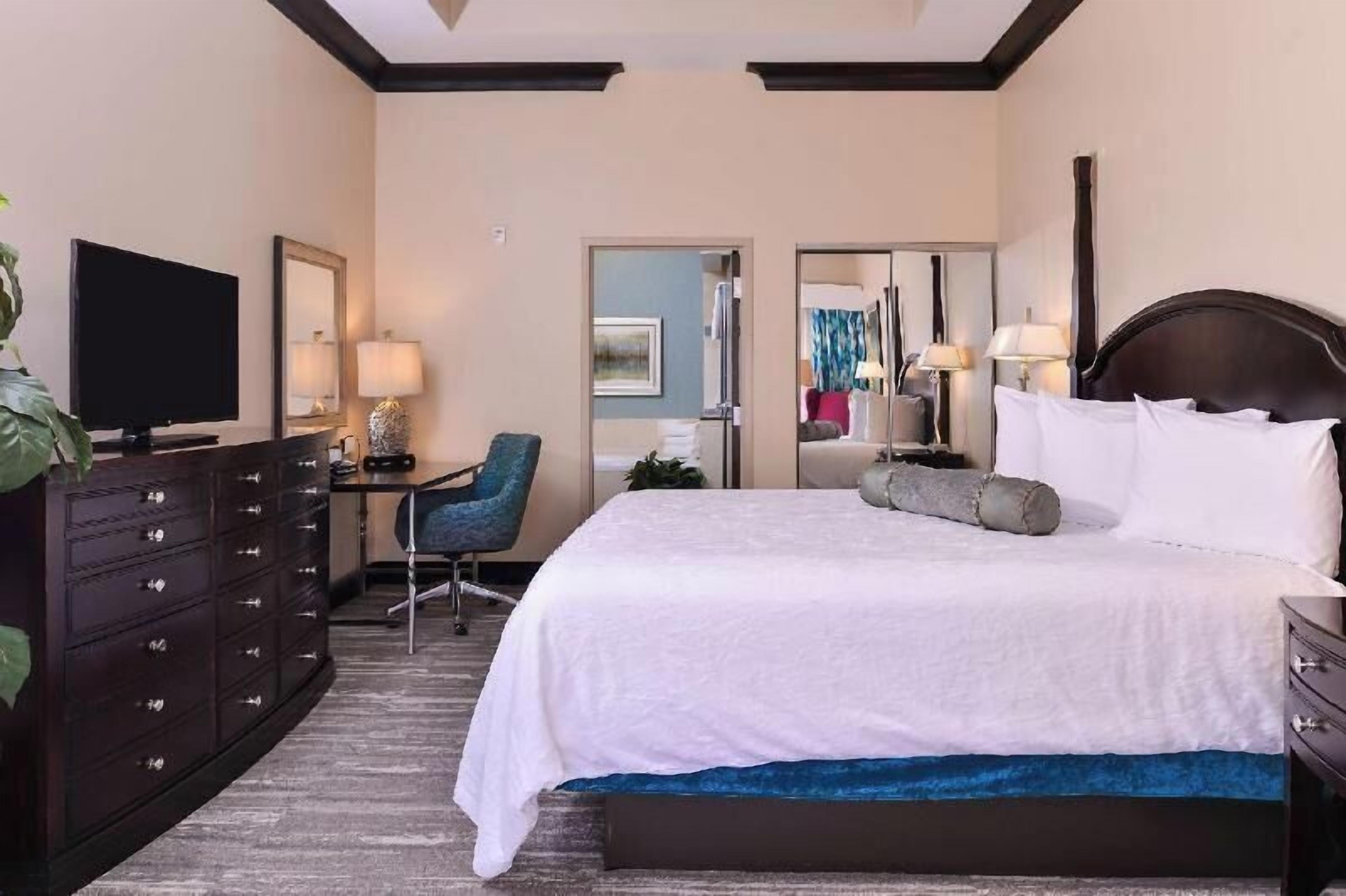 Premium bedding, down comforters, in-room safe, laptop workspace