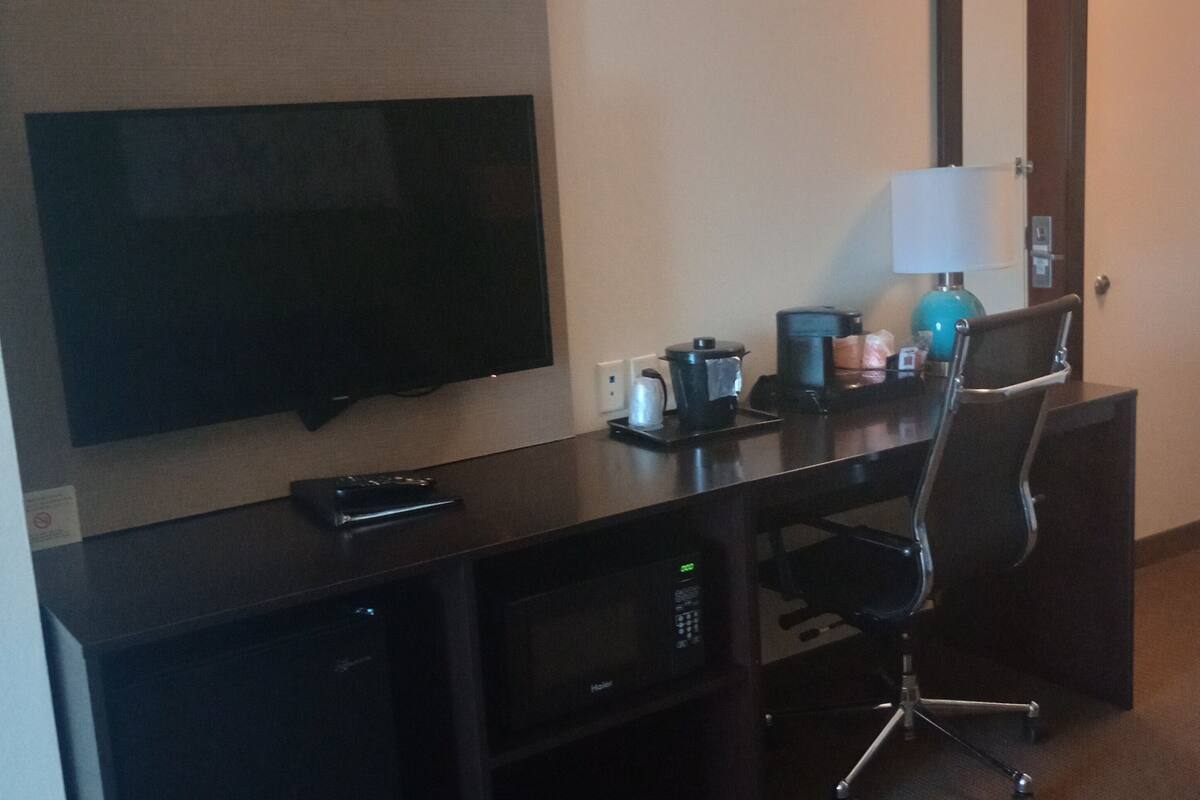 suite, 1 king bed, accessible, non smoking | desk, iron/ironing board, free cots/infant beds, free wifi