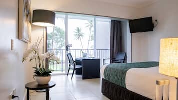 Beachfront Family Room | Premium bedding, blackout drapes, iron/ironing board, free WiFi