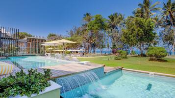 2 outdoor pools, pool umbrellas, pool loungers