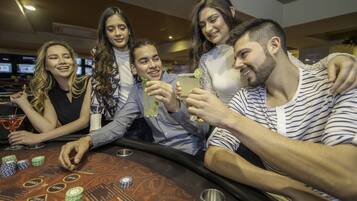 Guests can enjoy a lively gaming experience at the casino.
