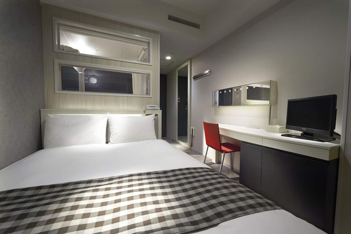 Couette en duvet d'oie, coffres-forts dans les chambres, bureau