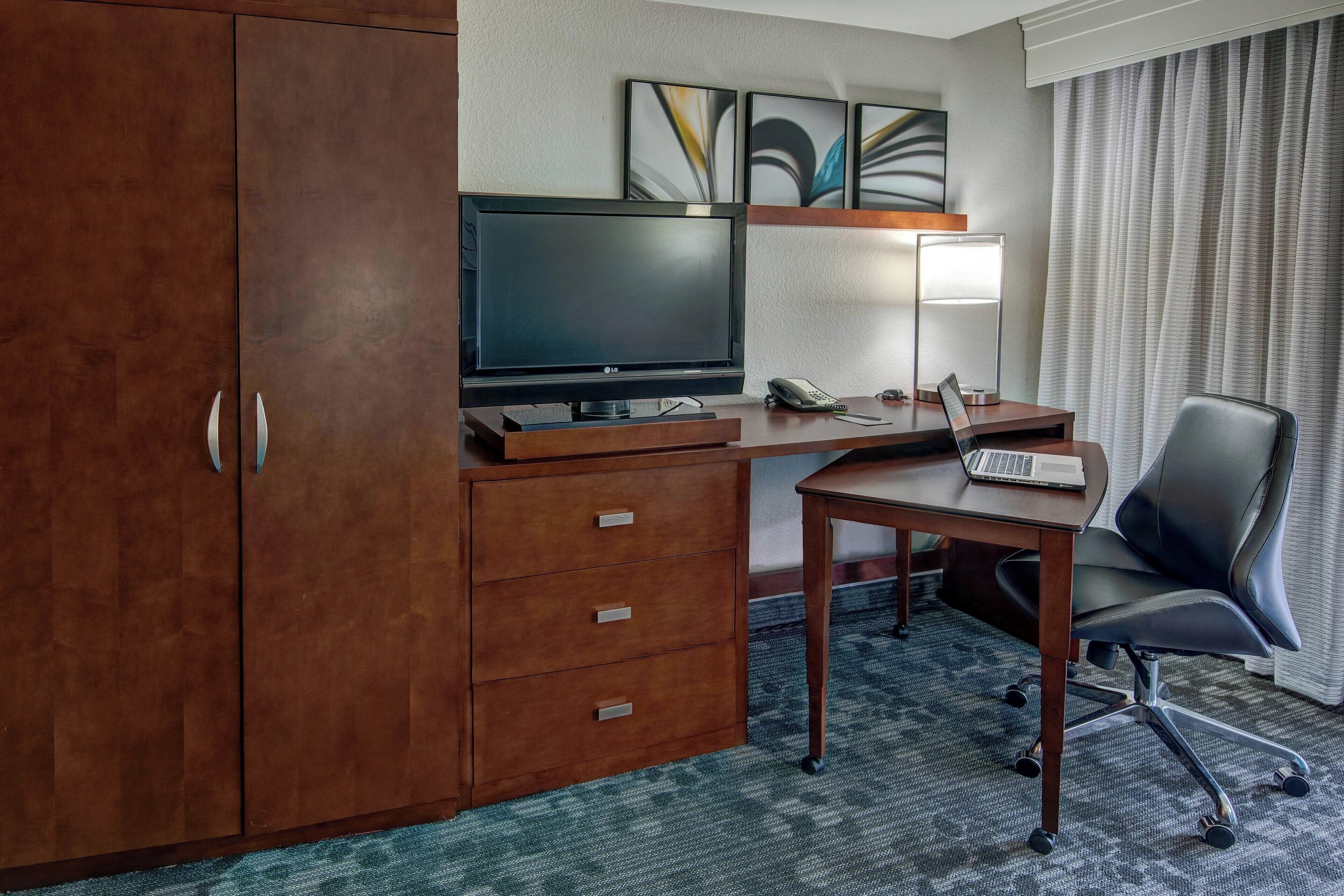 hypo-allergenic bedding, desk, laptop workspace, iron/ironing board