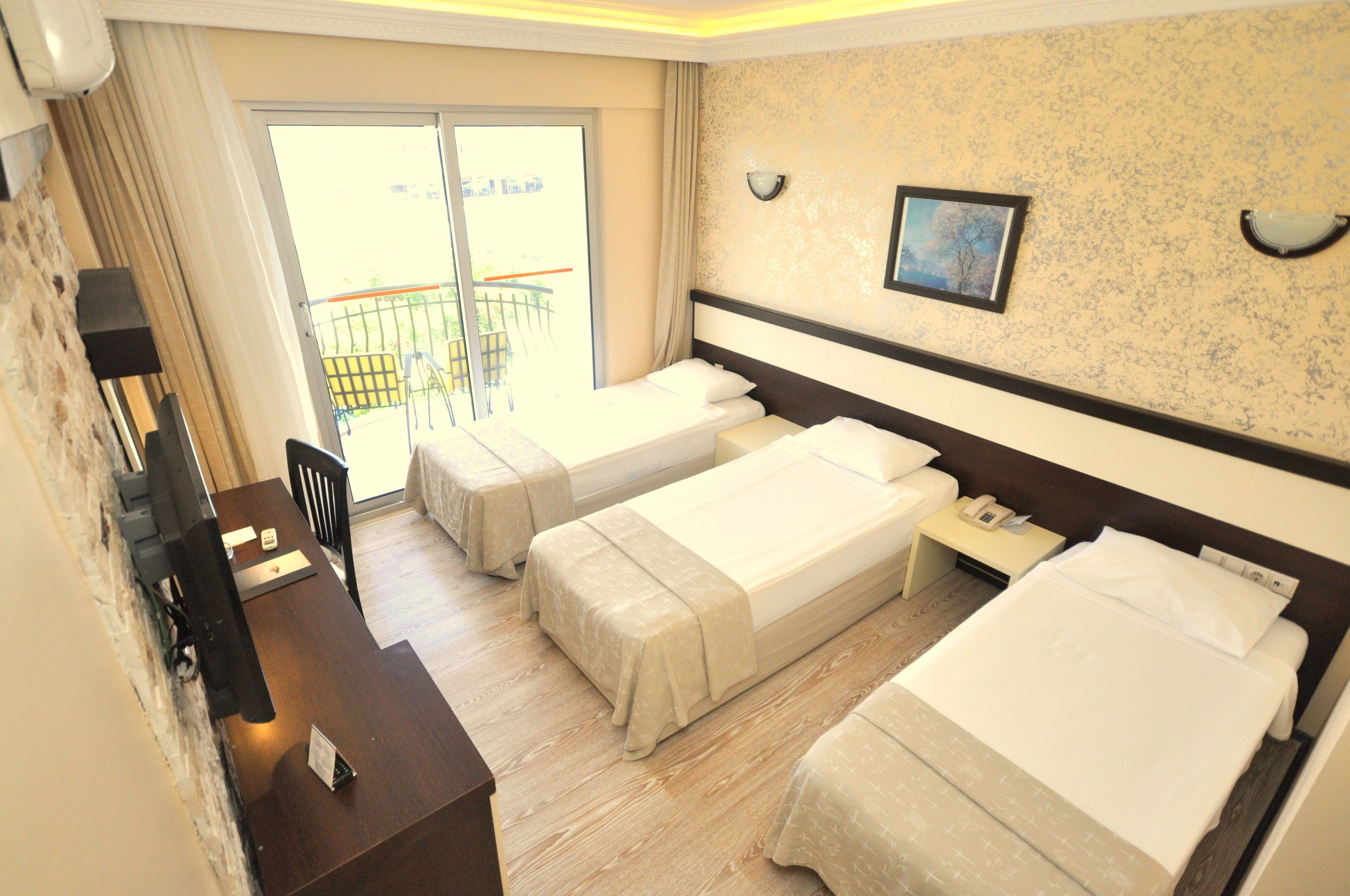 Kolmen hengen standard-huone | Egyptinpuuvillaiset lakanat, ylelliset vuodevaatteet, untuvapeitot