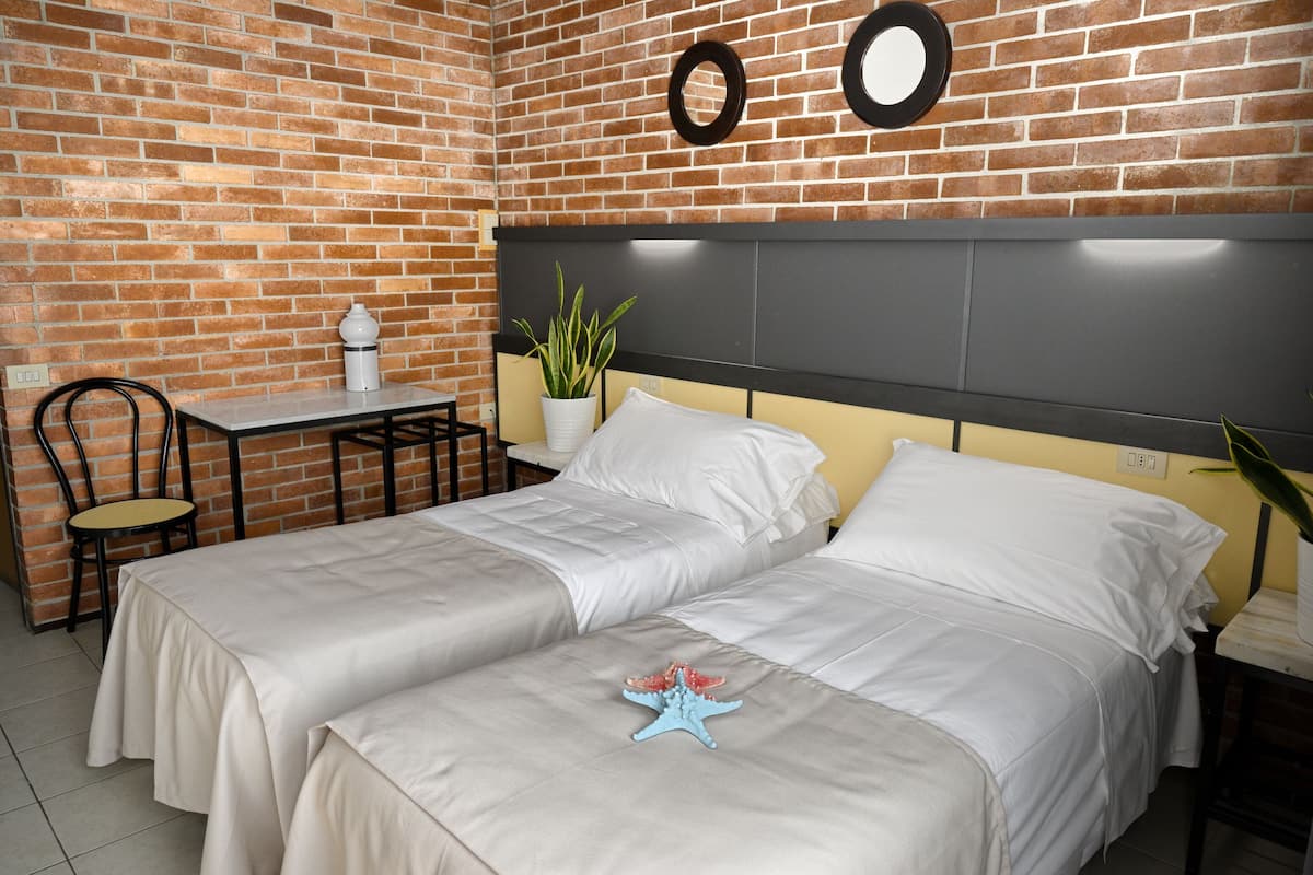 double or twin room | minibar, in-room safe, desk, blackout curtains