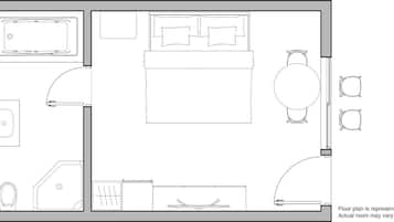 Plano de planta de una habitación de hotel con cama, escritorio, silla, mesita, espejo, lavabo e inodoro.