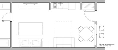 A floor plan of a hotel room with a bathroom, kitchenette, and a dining area.