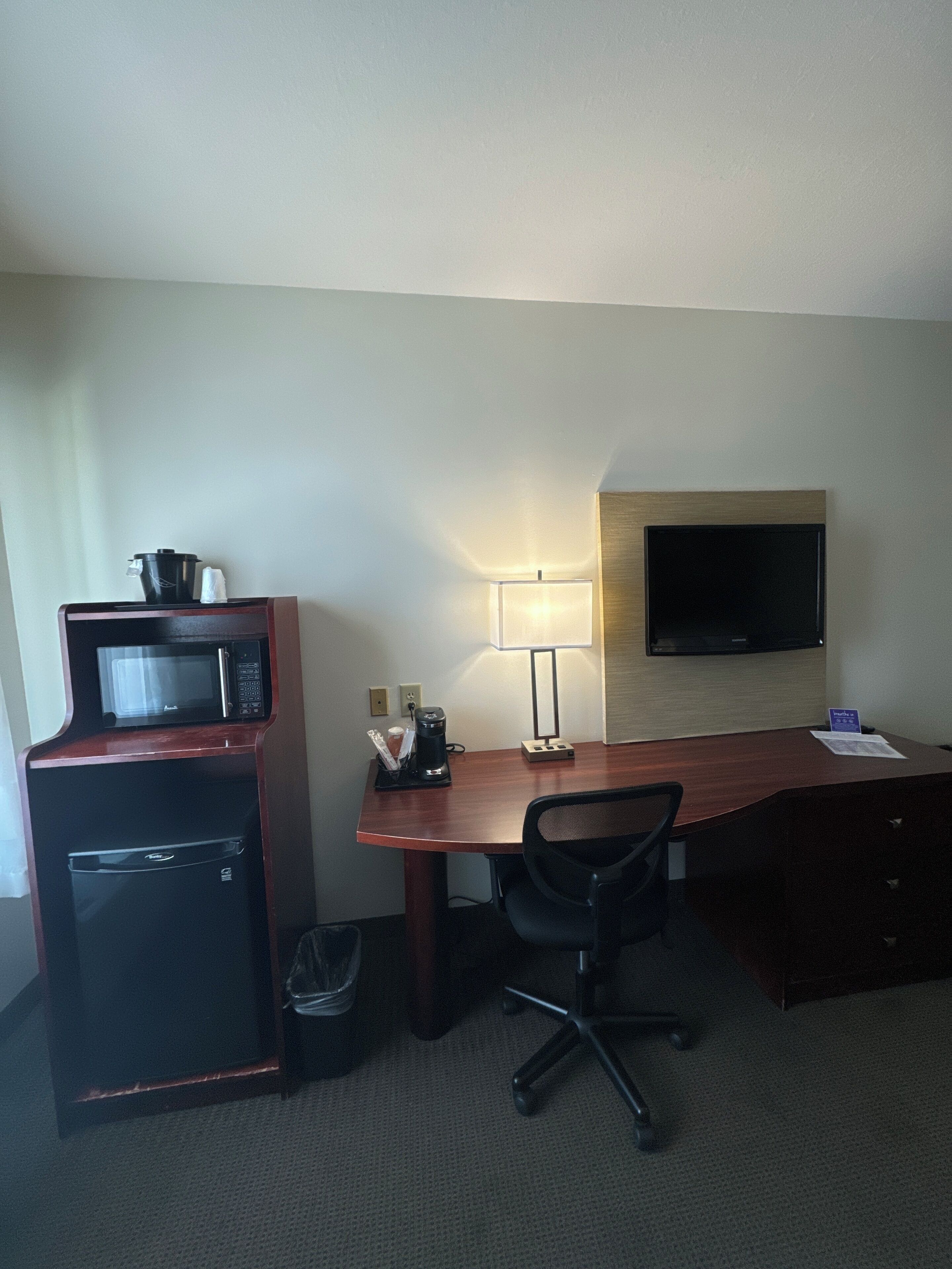 desk, laptop workspace, blackout curtains, iron/ironing board