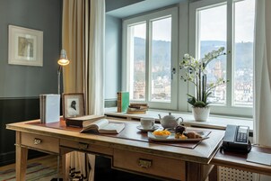 Premium bedding, free minibar items, in-room safe, soundproofing