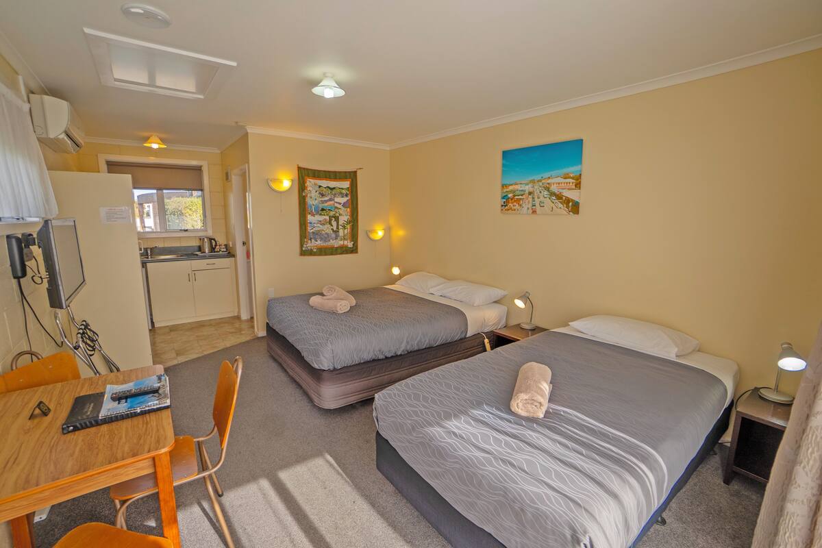 Family Studio, Multiple Beds | In-room safe, iron/ironing board, free WiFi, bed sheets