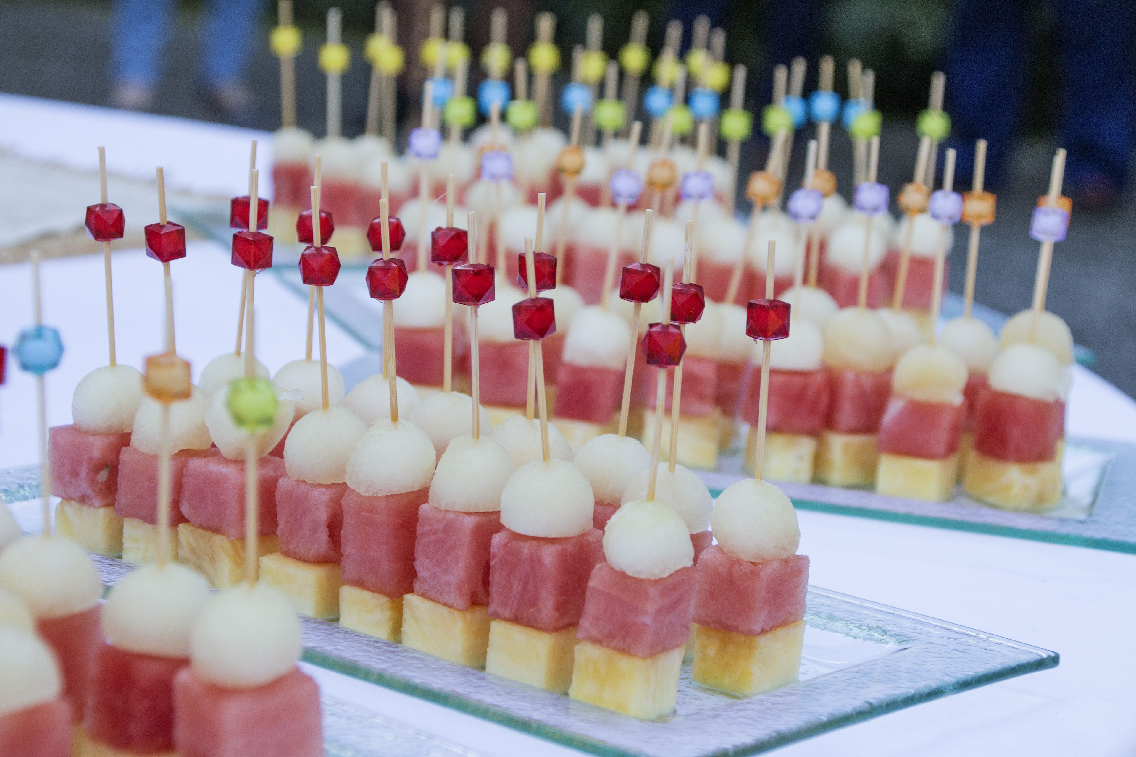 A table with food items arranged in rows.