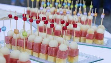 A table with food items arranged in rows.