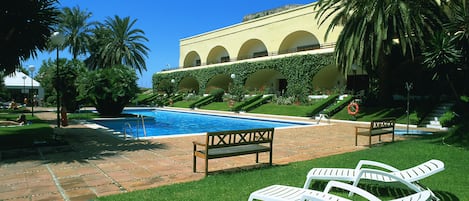 Outdoor pool, open noon to 8:00 PM, pool umbrellas, sun loungers