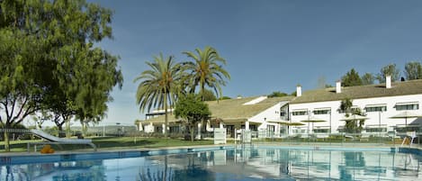 Seasonal outdoor pool, open 11:00 AM to 8:00 PM, pool umbrellas