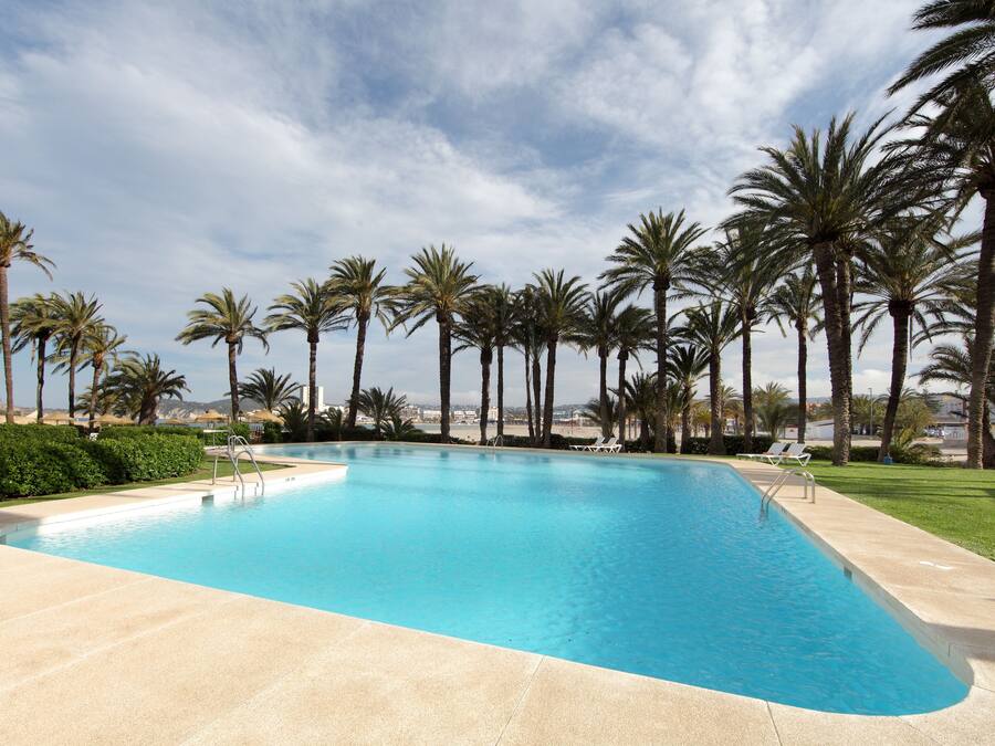 Seasonal outdoor pool, pool umbrellas, pool loungers