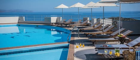 2 outdoor pools, pool umbrellas, sun loungers