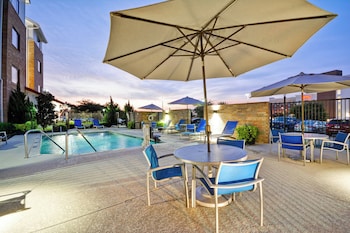 Outdoor pool, open 8 AM to 10 PM, pool umbrellas at TownePlace Suites by Marriott Dallas Lewisville