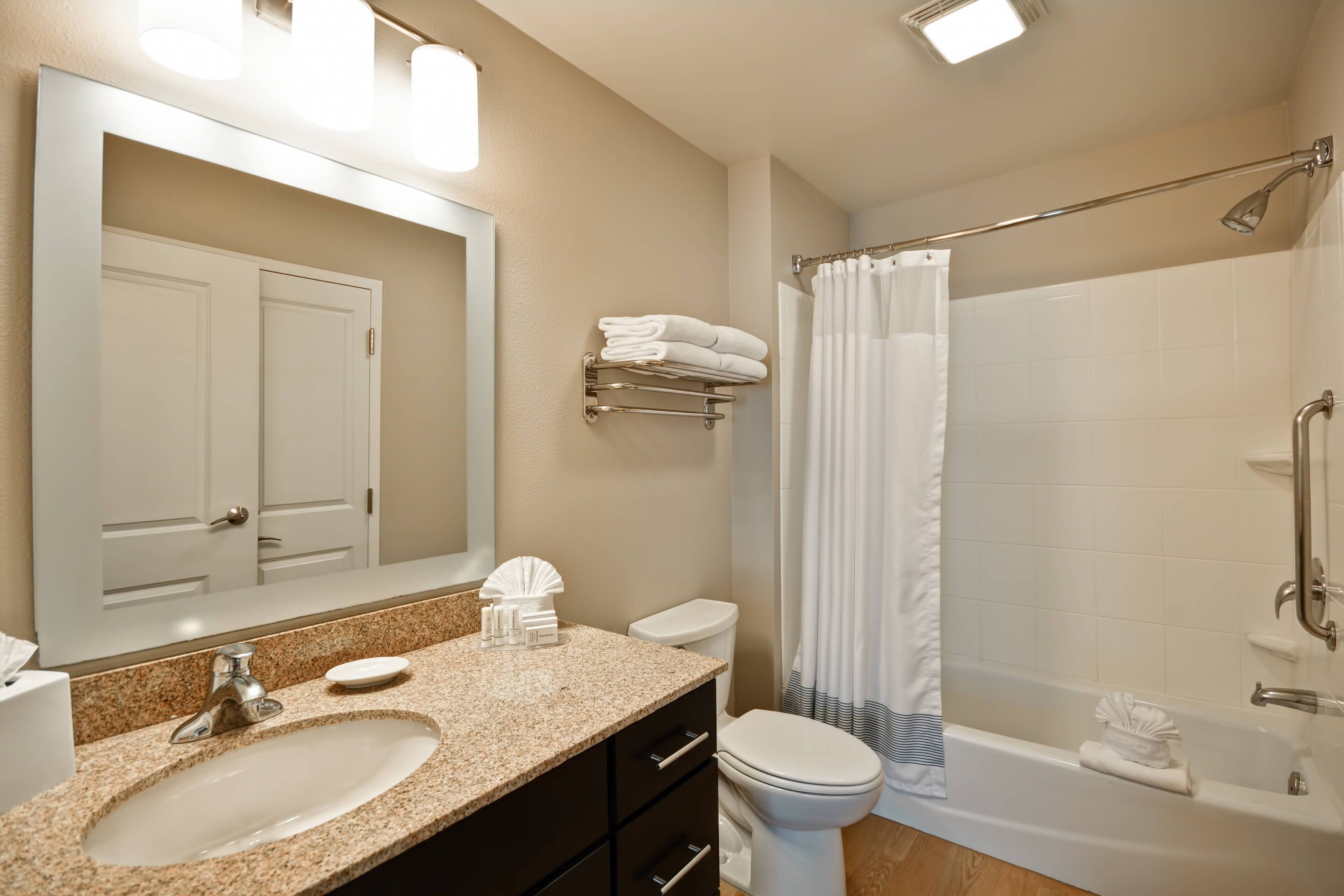 suite, 1 bedroom | bathroom | combined shower/bathtub, deep-soaking bathtub, rainfall showerhead