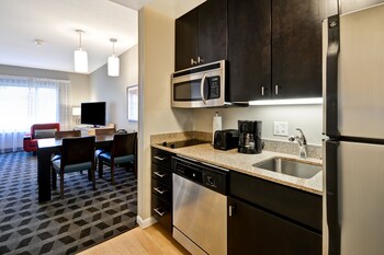 Full-size fridge, microwave, stovetop, dishwasher at TownePlace Suites by Marriott Dallas Lewisville