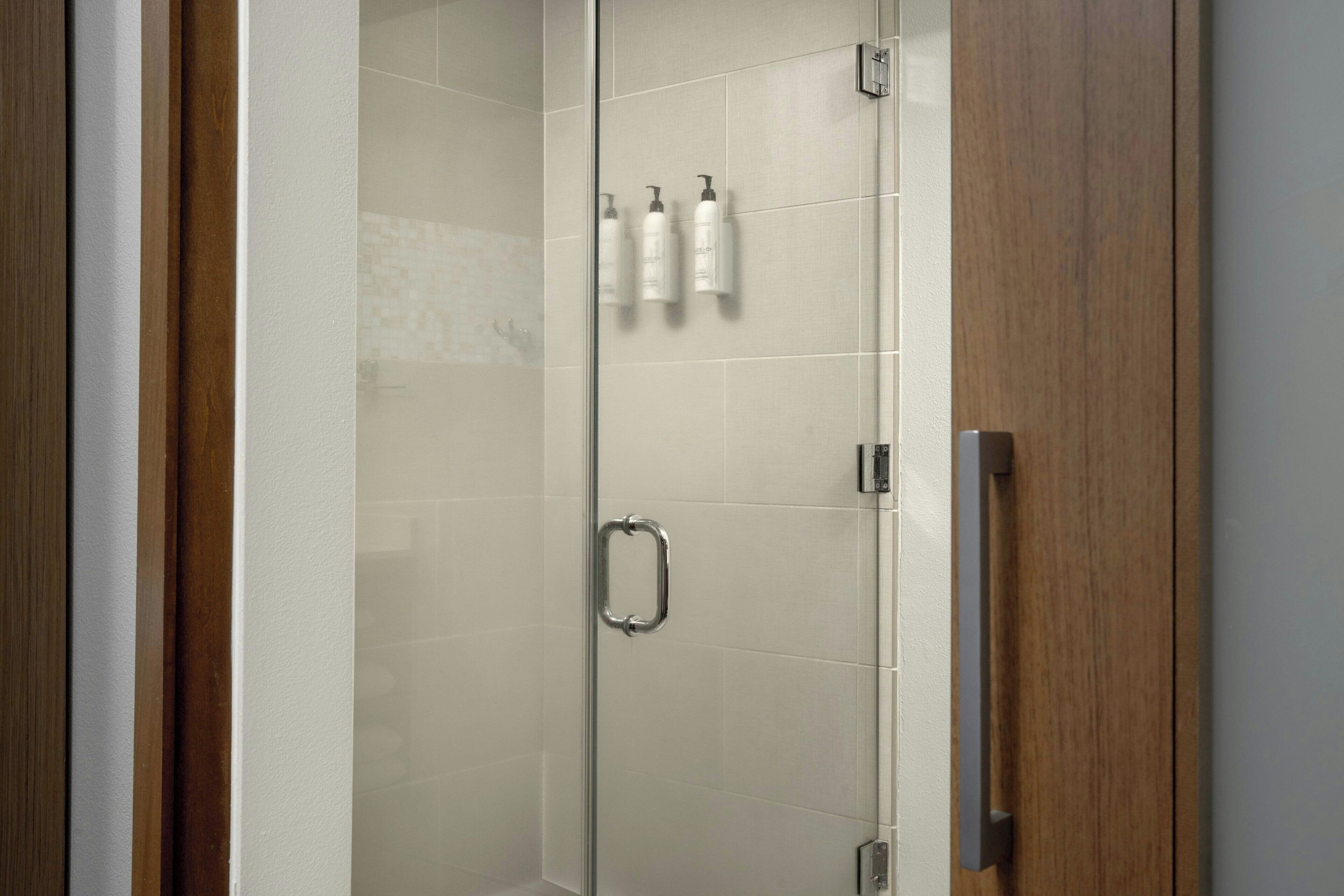 shower, free toiletries, hair dryer, towels