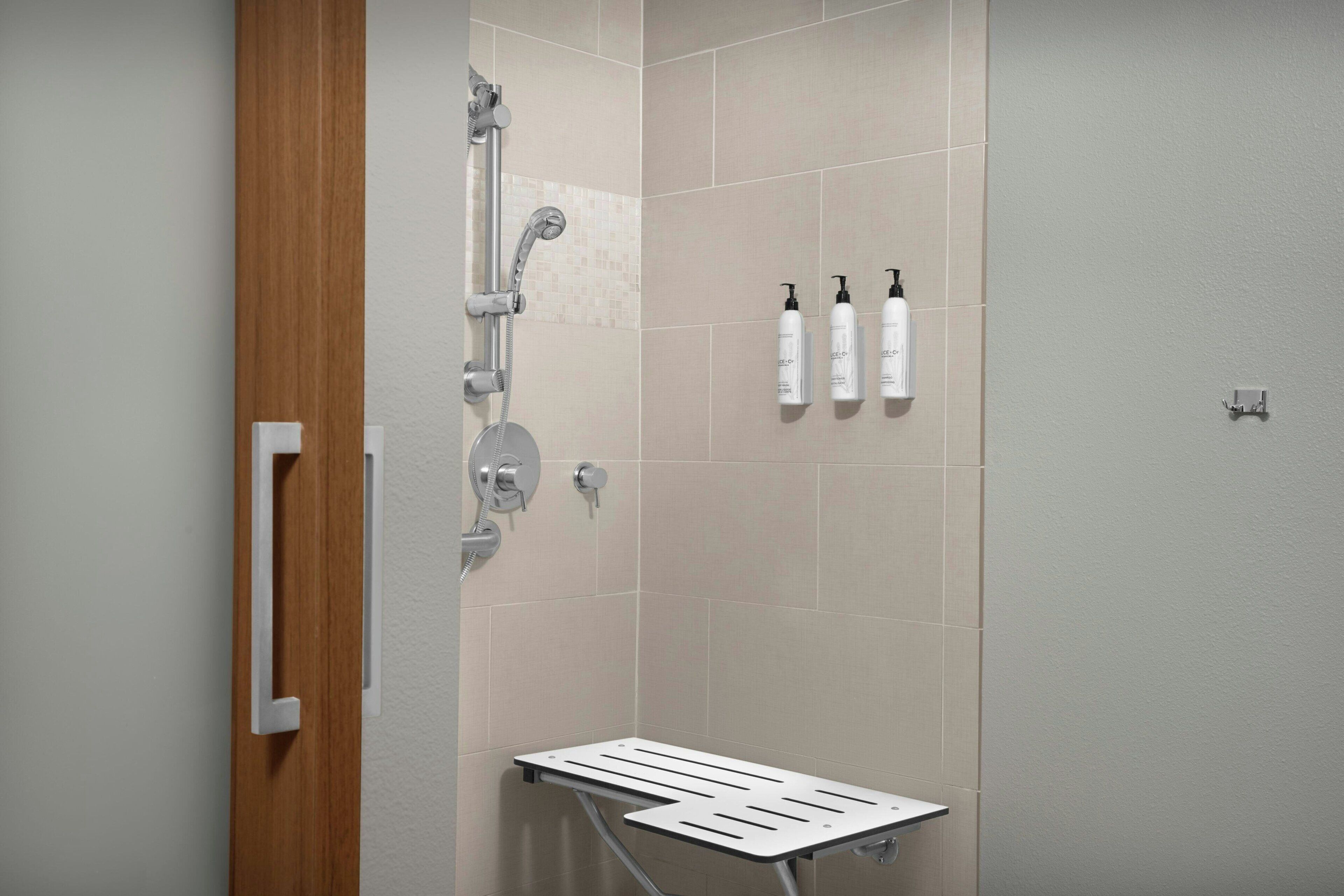 shower, free toiletries, hair dryer, towels