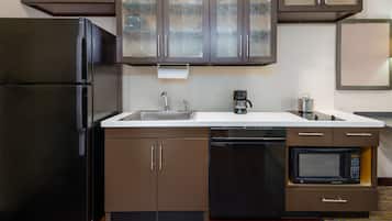 Full-sized fridge, microwave, stovetop, dishwasher
