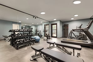 A gym with various exercise equipment, including dumbbells, treadmills, and exercise balls. - Staybridge Suites Wichita by IHG (Wichita)