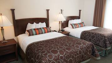 Premium bedding, down comforters, in-room safe, desk