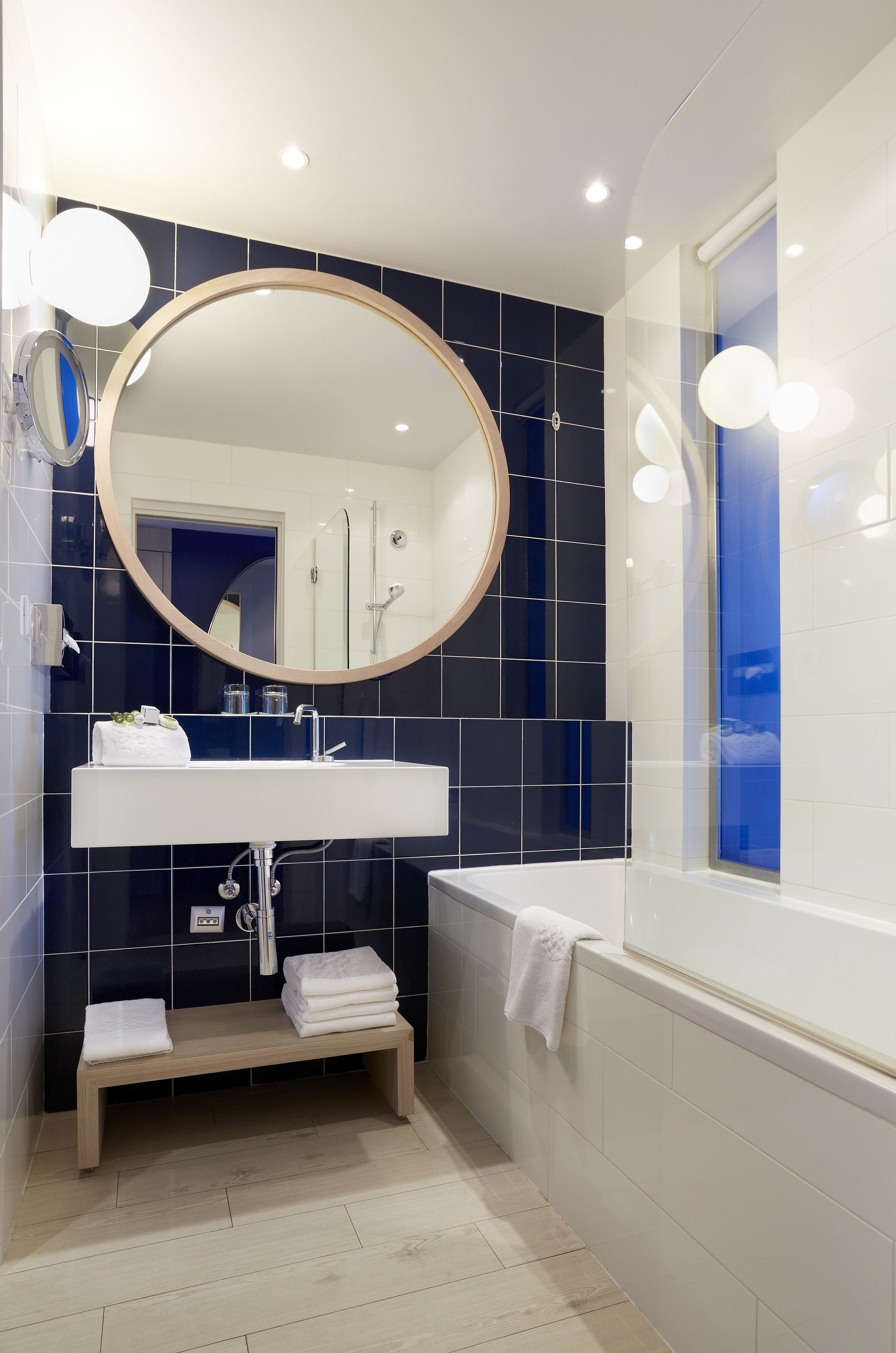 designer toiletries, hair dryer, towels