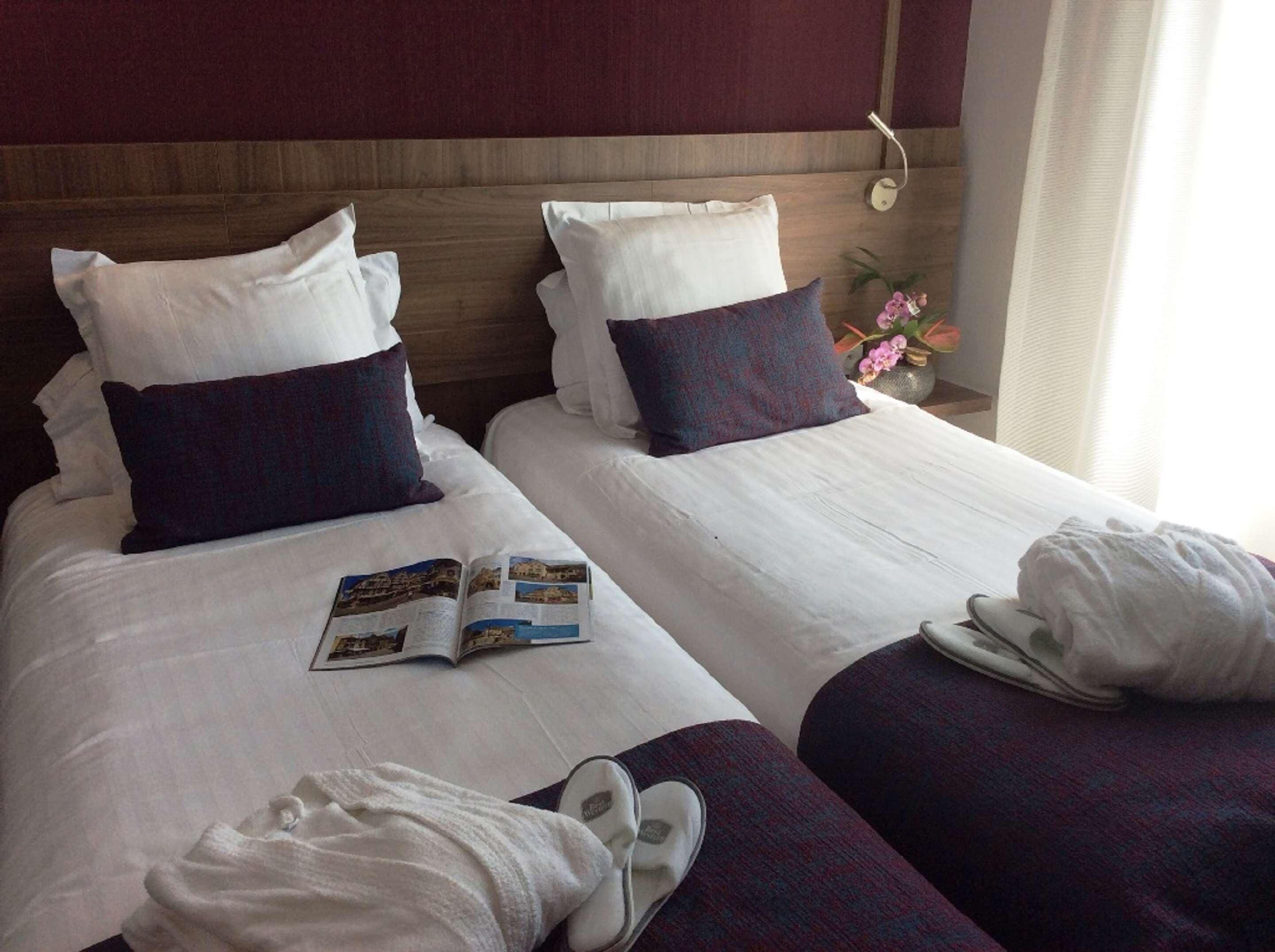 Hypo-allergenic bedding, desk, blackout drapes, soundproofing