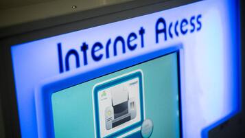 A digital display for internet access with a printer icon and the word "PRINTING" below it.