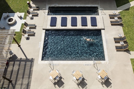 2 outdoor pools. NYLO Las Colinas Hotel, Tapestry Collection by Hilton
