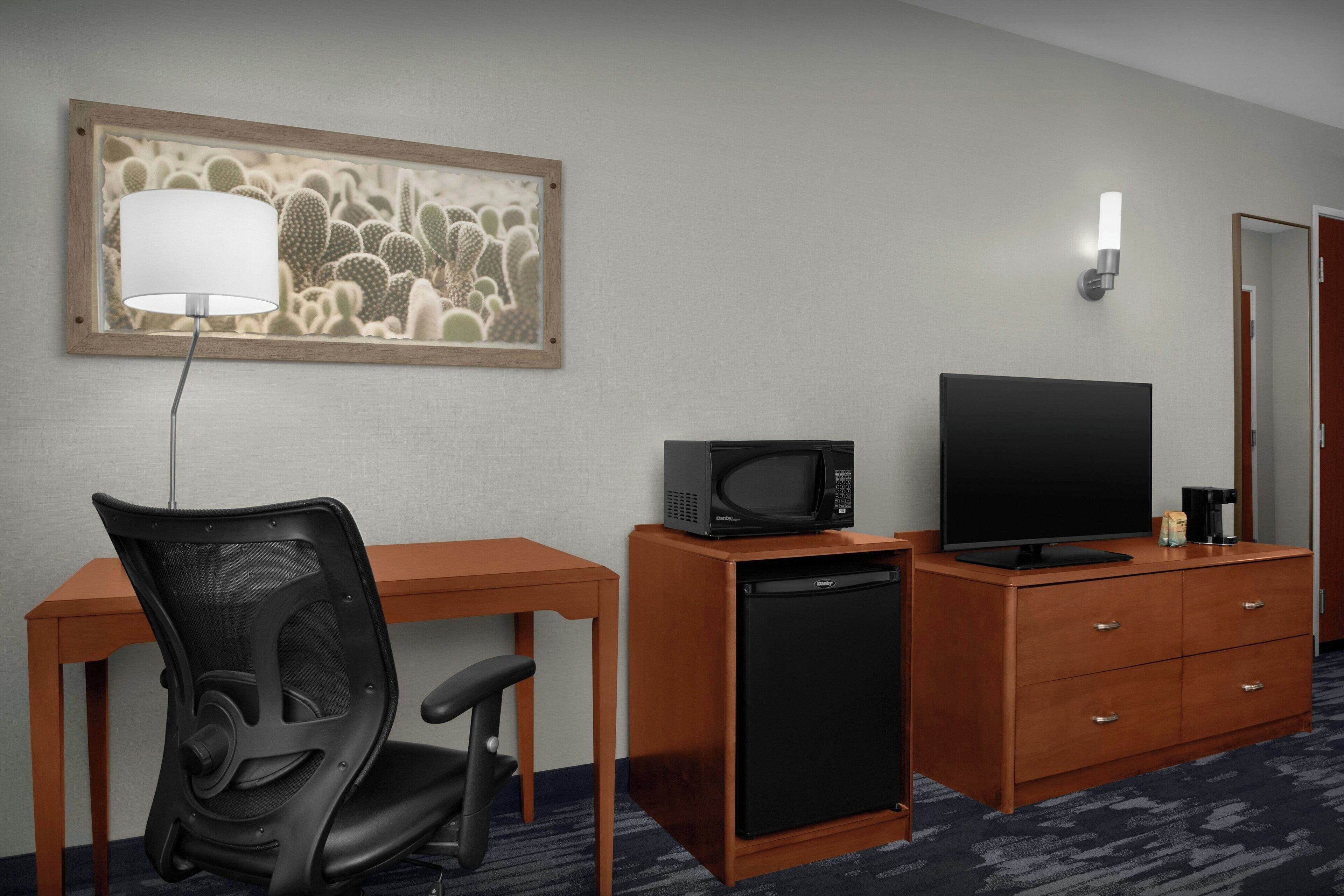 Hypo-allergenic bedding, desk, blackout drapes, iron/ironing board