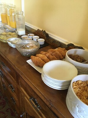 A breakfast buffet with various food items and beverages. - Dale Head Hall Lakeside Hotel (Keswick)